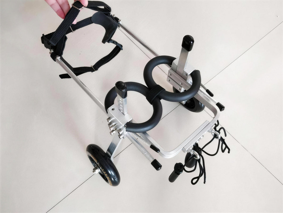 Black open-frame dog wheelchair for small and toy breeds, shown alone on a white background
