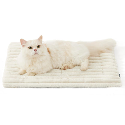 Dog resting on the self-warming mat inside a pet bed
